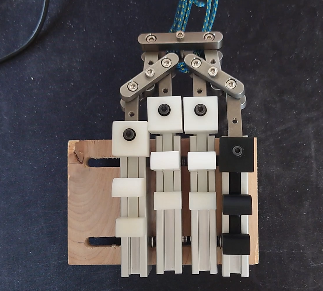 Funky Fingers Finger Trainer - linkage whippletree